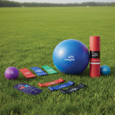 flexa.fit complete workout and recovery kit laid out on grass with gym ball, yoga mat, bands and loops