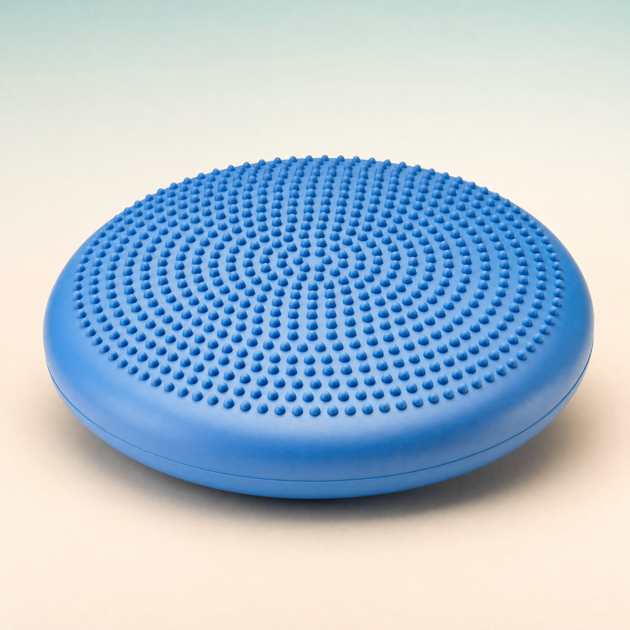 Blue flexa.fit balance wobble cushion with textured non-slip top, studio product shot